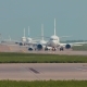 Airplanes in Queue on the Runway. Standing in Line To Take Off. - VideoHive Item for Sale
