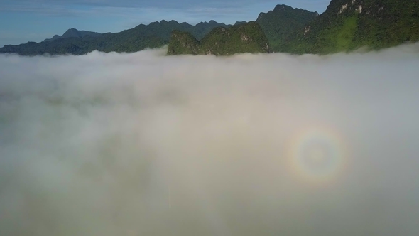 Thick Fog Lies Above Valley Below Freakish Mountain Chain