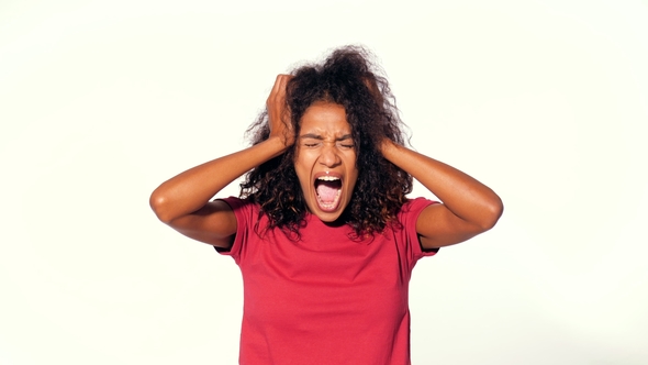 Screaming African American Woman in Red Top Covering Her Ears with Closed Eyes. Depressed Angry