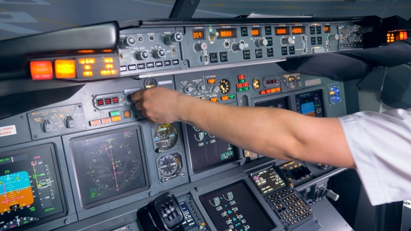 Indicators of an Aircraft Console Are Getting Switched on and Off By a Pilot