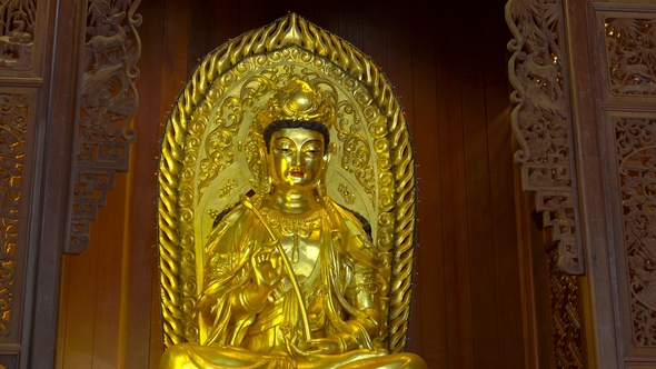 Golden Statue Inside of the Kek Lok Si Buddhist Temple on Penang Island, Malaysia