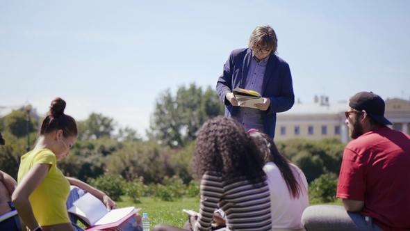 Professor Reads Important Information To Students