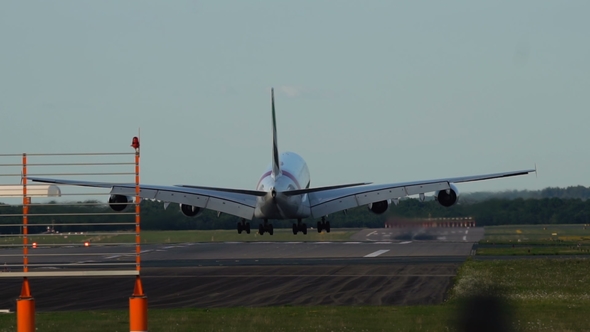 Wide Body Airplane Landing on Runway