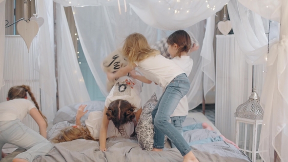 Five Children in the Fight Against with Pillows and Play