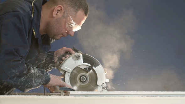 Wood Shavings and Dust Fly To Side When Processing Wood in Factory