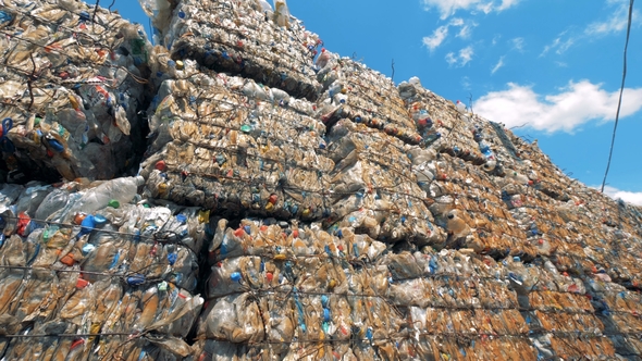Plenty Stacked Trash Blocks with Plastic Ready for Further Recycling