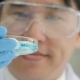Scientist Takes Out Petri Dish From a Cryogenic Nitrogen Container - VideoHive Item for Sale