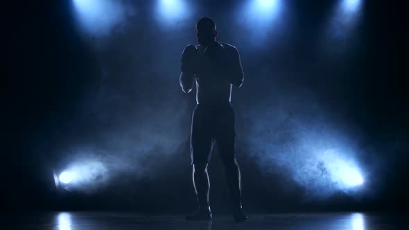 Boxer Concentrates Attention Before the Fight. Silhouette