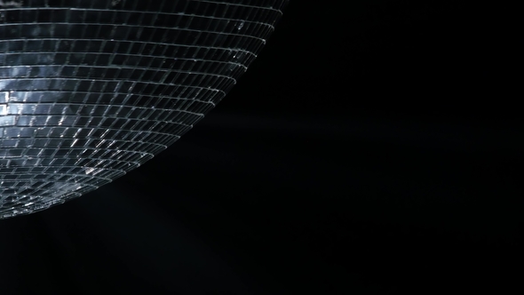 Mirror Ball, Also Known As a Disco Ball, Spinning Against Black