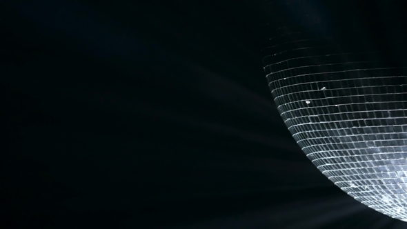 Mirror Ball, Also Known As a Disco Ball, Spinning Against Black