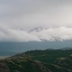 Clouds Cover the Snow-capped Mountains. The Weather Deteriorates, the Mountain Landscape - VideoHive Item for Sale