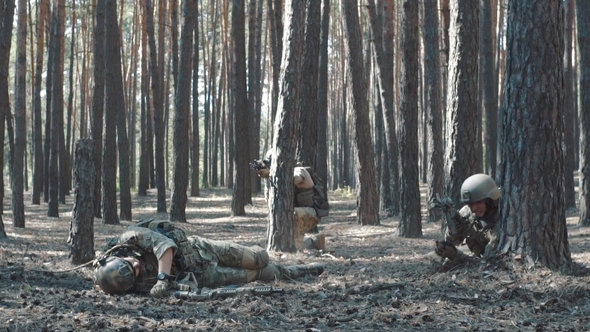 of Soldier Is Wounded on Battlefield in the Forest