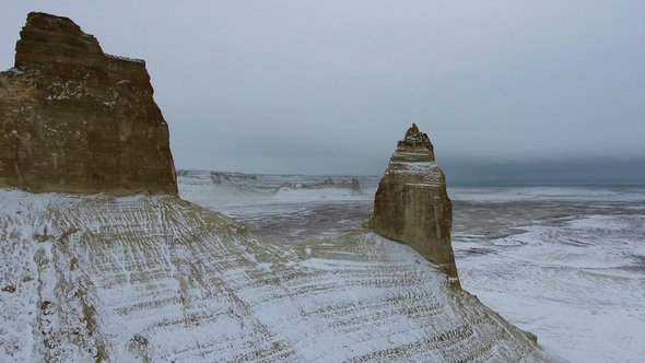 Amazing Aerial View of Snow-covering Ustyurt Sandy Mountains in Western Kazakhstan, Mangyshlak