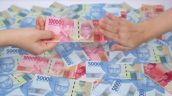 Giving and Rejecting Indonesian Money