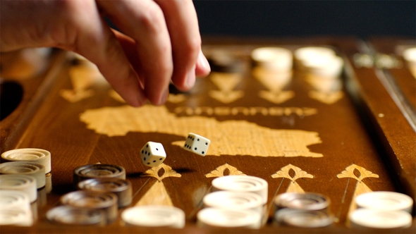 Throwing Dices To Backgammon Table