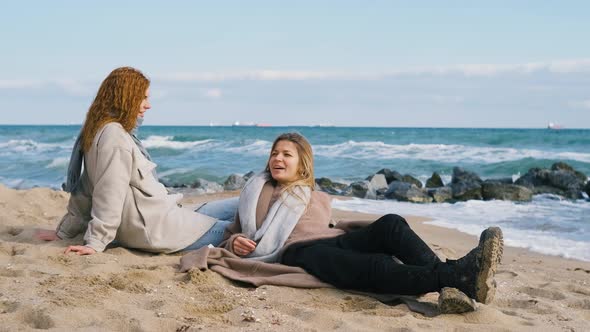 Beautiful Girls Walk Near the Sea