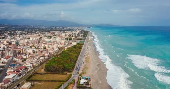 Stormy Sea with Coast and City