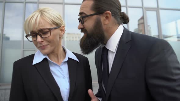 Businessman Yelling at Female Colleague Lady Making Stop Sign, Rights Protection