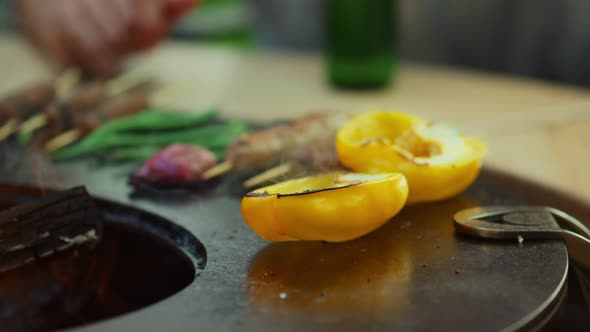 Unknown Guy Cooking Food on Bbq Grill Outside