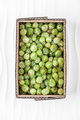 Gooseberries in a cardboard box on a white textured background. - PhotoDune Item for Sale