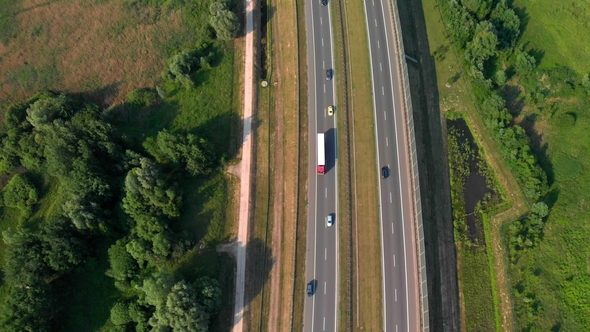 Aerial Vertical Shot. Cars Driving By the Road. Traffic on the Highway