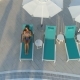 Beautiful Girl Lies on a Sun-bed By the Pool, Drinking a Cocktail - VideoHive Item for Sale