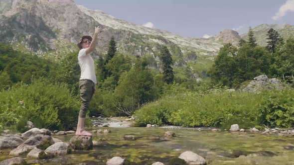 Traveling Man Doing Selfie Photo To Smartphone on Mountain and River Landscape