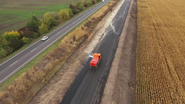 Preparation of Surface with Water Tank Truck