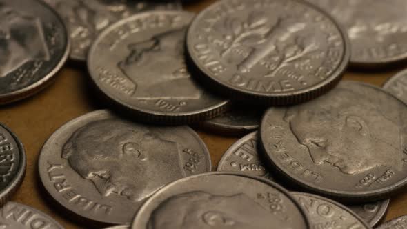 Rotating stock footage shot of American dimes (coin - $0.10) - MONEY 0213