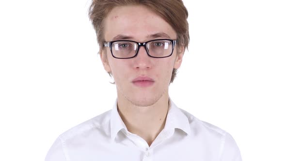 Serious Man Looking at Camera in Studio on White Background