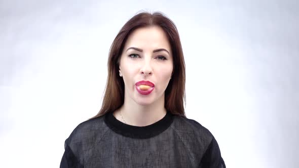 Girl with Yellow Bubble of Chewing Gum