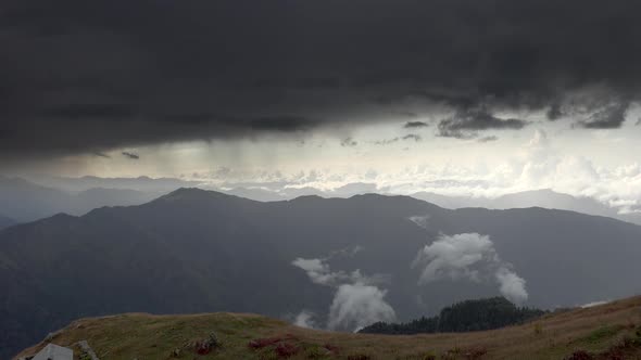 Black Dark Storm Clouds in Mountainous Meadows