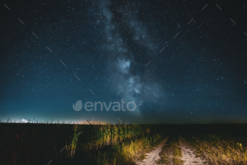 Night Starry Sky With Milky Way Glowing Stars Above Country Road / Photodune, Misc