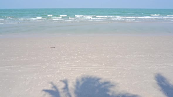 Beautiful tropical beach sea ocean with blue sky and white cloud