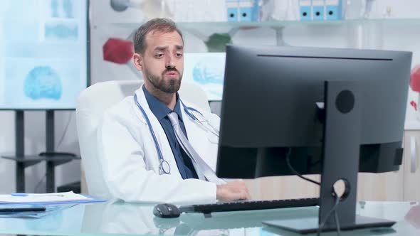 Scientist Having a Video Call in His Modern Research Center