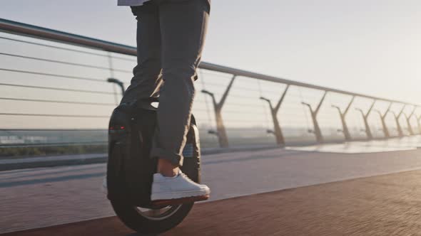 Elderly Man Practices Selfbalance Riding Electric Unicycle