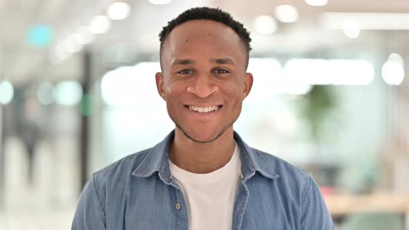 Portrait of Cheerful Casual African Man Smiling at Camera