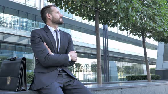 Tense Beard Businessman Ouside Office