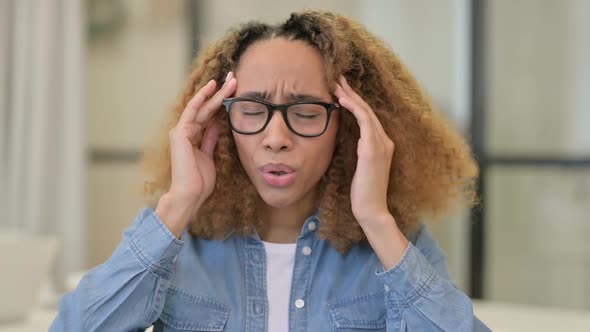 Portrait of African Woman Having Headache