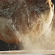 Loaf of Fresh Bread Falls Down Onto Table and Rolls Away - VideoHive Item for Sale