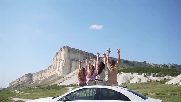 Parents and Two Little Kids on Summer Car Vacation