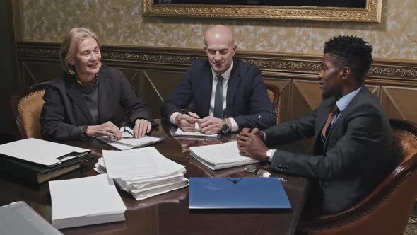 Group Portrait of Multiethnic Lawyers at Office Meeting