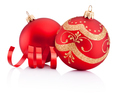 Red christmas decoration baubles and curling paper isolated on w - PhotoDune Item for Sale