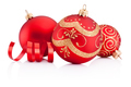 Red Christmas decoration baubles and curling paper isolated on w - PhotoDune Item for Sale