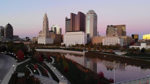 Columbus Ohio Skyline at dusk with the Scioto River in the foreground