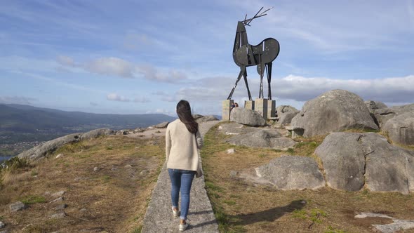 Woman walking near Cervo viewpoint in Vila Nova de Cerveira with beautiful landscape view