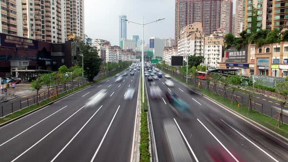 Timelapse Shenzhen Road with Heavy Traffic By City Buildings