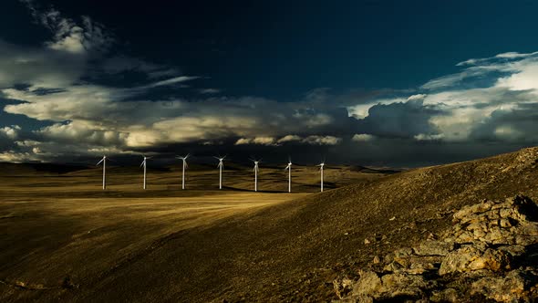 Wind farms in the field , animation on renewable electricity