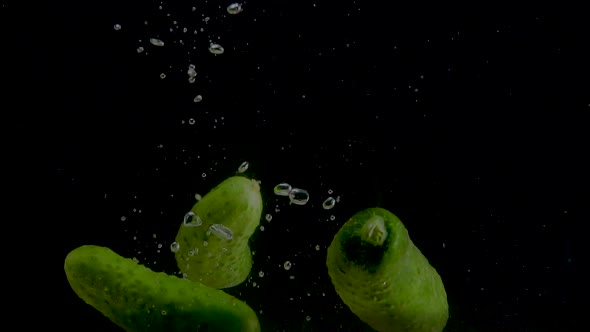 Cucumber Slow Motion Closeup Falling in Water