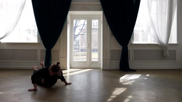 Young Man is Dancing Modern Choreography Guy is Rehearsing Alone in Repetition Hall